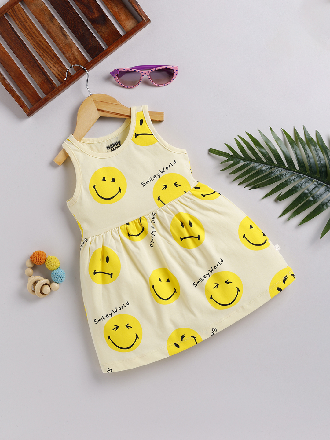 Happy Faces Smiley World Printed Pure Cotton Frock For Girls (Butter, Pack Of 1)